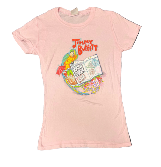 Light pink short sleeve Jimmy Buffett tee featuring a colorful tropical travel graphic with a parrot beside an open passport marked “Welcome to Fin Land.” A tropical drink and beach inspired details surround the artwork, with “Jimmy Buffett” above and “Tour 2011” below.