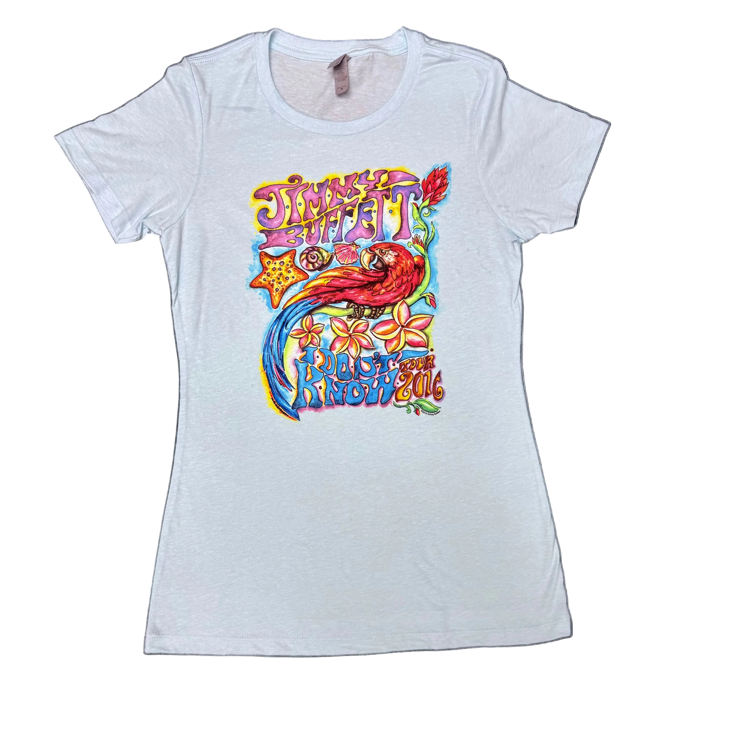 Light blue short sleeve Jimmy Buffett tee featuring colorful Jimmy Buffett lettering above a tropical graphic with a large red macaw, hibiscus flowers, foliage, and bright blue, orange, yellow, and green accents. “This One’s For You” tour lettering appears below the artwork.
