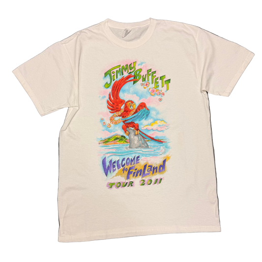 White short sleeve Jimmy Buffett tee featuring a colorful red parrot perched on a shark fin in the ocean, with a tropical island and clouds in the background. Green “Jimmy Buffett” lettering appears above the artwork, with “Welcome to Fin Land Tour 2011” printed below in purple, yellow, pink, and green.